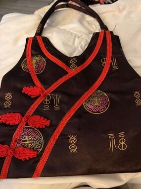 Elegant Black Satin Shoulder Bag with Red Trim